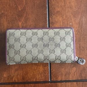 Authentic Gucci wallet with dark pink leather trim